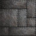 Dark metal plates with rivets seamless background or texture Royalty Free Stock Photo