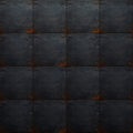 Dark metal plating texture with visible rivets and subtle rust detailing creating a grunge industrial surface background for Royalty Free Stock Photo
