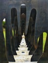 Dark metal sculpture of abstract hands Quito.