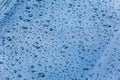 Dark metal surface covered in water drops Royalty Free Stock Photo