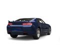 Dark midnight blue modern car - rear side view Royalty Free Stock Photo