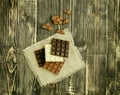 Dark , milk and white chocolate bar. Chocolate over rustic wooden background Royalty Free Stock Photo