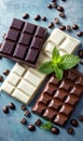 Dark, milk, white chocolate bars, mint, coffee beans on blue background Royalty Free Stock Photo