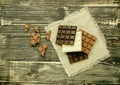 Dark , milk and white comemade chocolate factory background. Delicious chocolate pieces Royalty Free Stock Photo