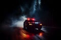 In the dark and misty night, a police car gives chase