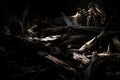 Dark and moody background of splintered wood with dramatic lighting and deep shadows