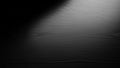 Dark moody black wood grain texture with subtle spotlight illumination Royalty Free Stock Photo