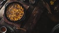 Dark And Moody Bobotie With Chutney In Rustic Table Setting, created using generative AI tools