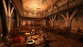 Dark moody medieval dining hall with tables laid for a great feast. 3D rendering