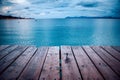 Dark morning by the sea. Pier in storm. Solitude, Loneliness concept photo Royalty Free Stock Photo