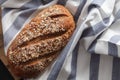 Dark multigrain bread whole grain fresh baked on rustic