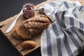 Dark multigrain bread whole grain and jam fresh baked on rustic Royalty Free Stock Photo