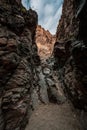 Dark Narrow Opening At The End of Upper Burro Mesa Pouroff In Big Bend