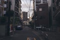 Dark narrow street, city of Tokyo Japan