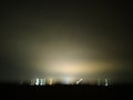 Dark night behind the city with a few lights in the distance, sky without stars, dark night,  panorama Royalty Free Stock Photo