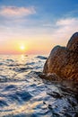 Dark night sea with protruding stones