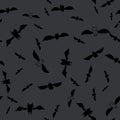Dark of the Night seamless repeat vector swarm of bats silhouetted against the gray night sky Royalty Free Stock Photo