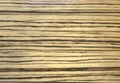 Dark oak zebrano texture of natural wood on a slice closeup