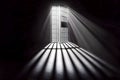 A dark, ominous jail cell illuminated by rays of light piercing through the barred window. Solitude and confinement symbolized by Royalty Free Stock Photo