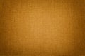 Dark orange background from a textile material. Fabric with natural texture. Backdrop Royalty Free Stock Photo