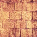 Dark orange colored wall brick Abstract grunge background with distressed aged texture and brush painting Royalty Free Stock Photo