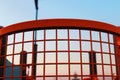 A dark orange fence in a playground