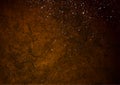 Dark orange grunge texture background with grey particles