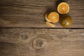 Dark orange isolated on wooden background. Brown oranges Royalty Free Stock Photo