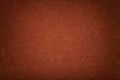 Dark orange matt suede fabric closeup. Velvet texture of felt Royalty Free Stock Photo