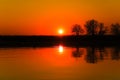 Dark orange sunset over the river Royalty Free Stock Photo