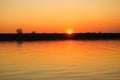 Dark orange sunset over the river Royalty Free Stock Photo