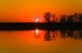 Dark orange sunset over the river Royalty Free Stock Photo