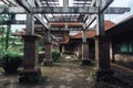 Abandoned building with dirty walls and broken roof