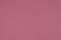 dark pink colored low contrast Concrete textured background with roughness and irregularities