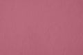 dark pink colored low contrast Concrete textured background with roughness and irregularities