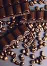 Dark porouse chocolate and coffee beans flat lay. Brown background Royalty Free Stock Photo