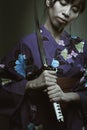 Dark portrait of samurai woman Royalty Free Stock Photo