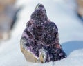 Dark purple Amethyst Quartz Druse Geode from Uruguay on white snow