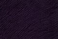 Dark purple background from soft textile material. Fabric with natural texture. Royalty Free Stock Photo