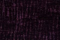 Dark purple background from a soft textile material. sheathing fabric with natural texture. Royalty Free Stock Photo