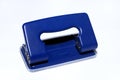 A dark purple colored hole punch Royalty Free Stock Photo