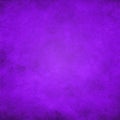 Dark purple, grunge paper texture background. Darkened edges, glowing center. Royalty Free Stock Photo