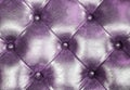 Dark purple leather upholstery sofa background for decoration. Royalty Free Stock Photo