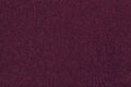 Dark purple matt suede fabric closeup. Velvet texture of felt Royalty Free Stock Photo
