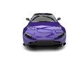 Dark purple modern sports car - front view Royalty Free Stock Photo