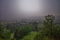 Dark purple sky by thunderstorm turmoil over golf course in late spring Royalty Free Stock Photo