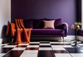 Dark purple sofa with a blanket beside a small table Royalty Free Stock Photo