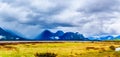 Dark rain clouds on a cold spring day at over the Pitt River and the lagoons of Pitt-Addington Marsh in Pitt Polder at Maple Ridge Royalty Free Stock Photo