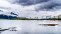 Dark rain clouds over Pitt-Addington Marsh Nature Reserve near PItt Lake near Maple Ridge, British Columbia, Canada Royalty Free Stock Photo