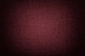 Dark red background from a textile material. Fabric with natural texture. Backdrop Royalty Free Stock Photo